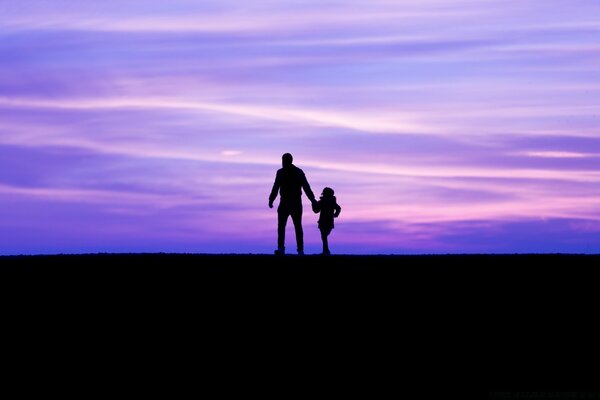 Silhouette of sunset walks