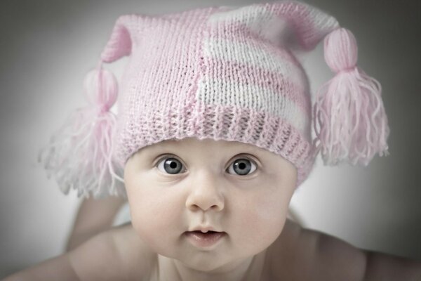 Photo of a newborn in a hat