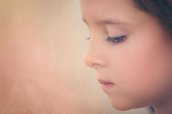 Portrait of a cute girl with long eyelashes