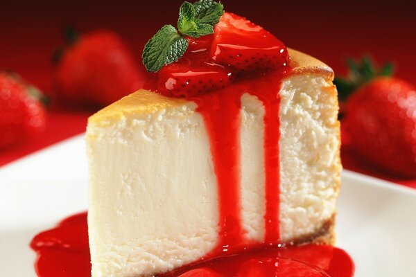 High sponge cake decorated with strawberries