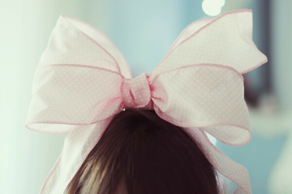 Fashionable pink bow on the head