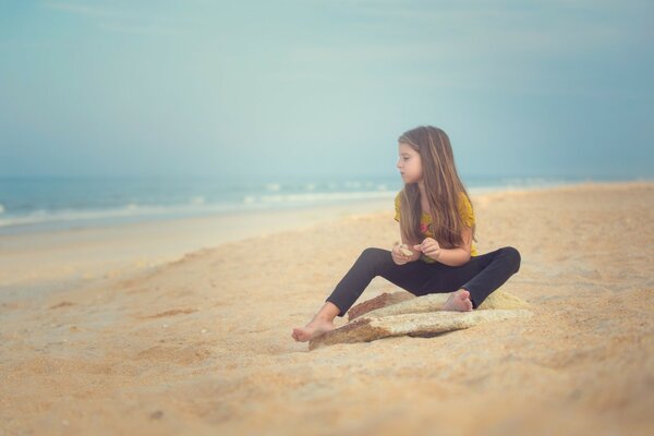 Children on the beach of the beautiful sea