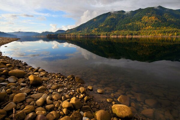 Smooth pebbles on the bank of a mountain river