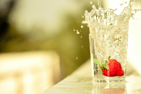 Drinks in a glass glass, fruit and ice