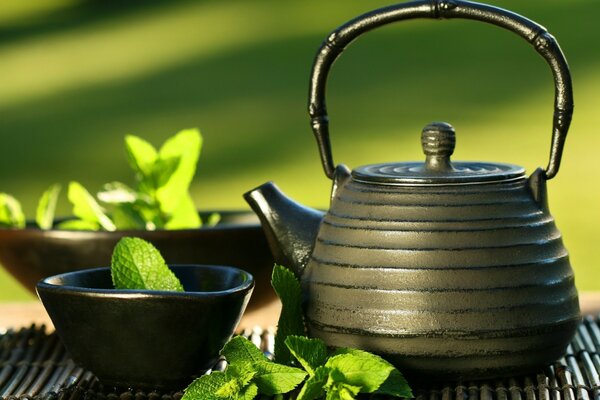 Drink tea in a ceramic teapot