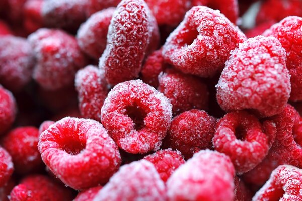 Delicious raspberries in the image