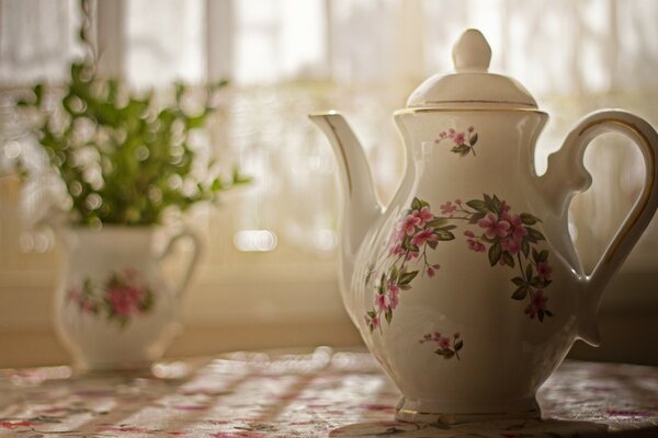 Beautiful teapot on the kitchen table