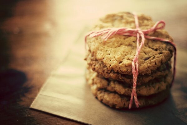 Sweet cookies with pink thread