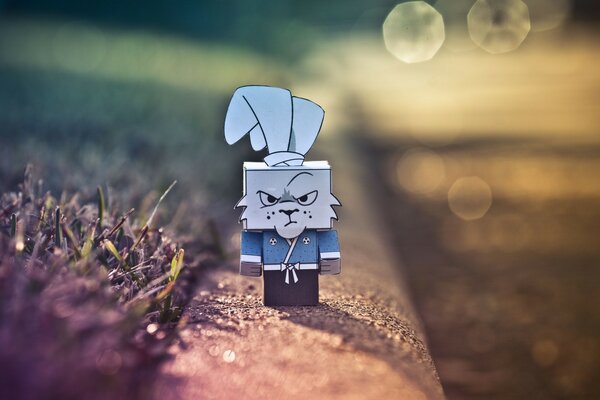 Angry cartoon rabbit is standing on the curb