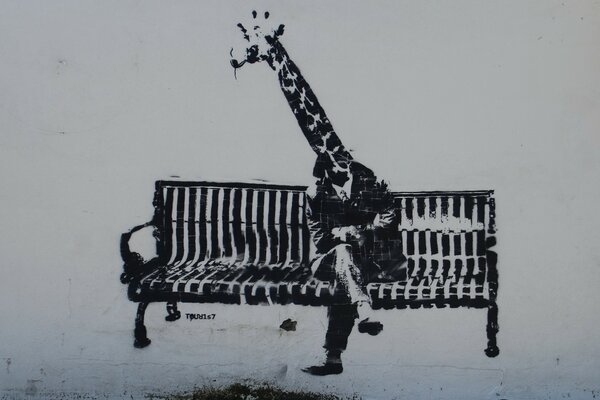 Graffiti giraffe in a suit on a bench