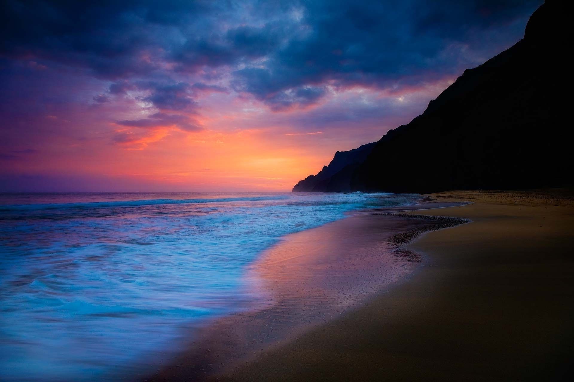 the sunset and sunrise water sunset beach dusk ocean seashore sun dawn sea evening travel sand seascape surf