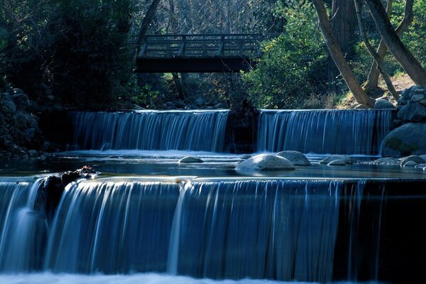 Steps from waterfalls on a mountain river