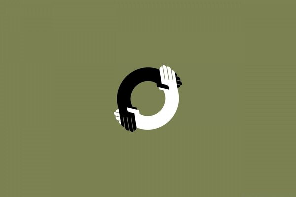 Yin yang handshake on green background