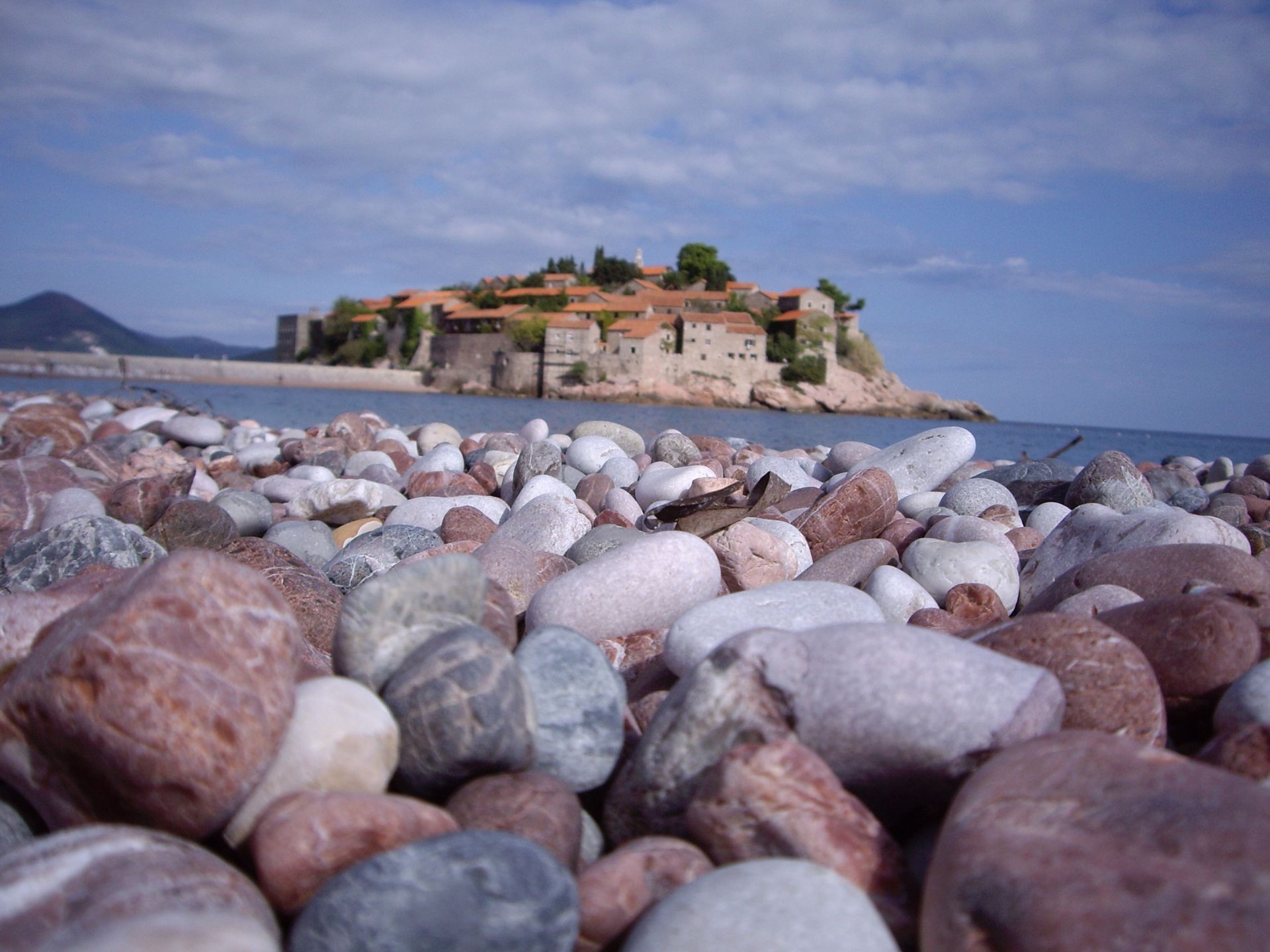 sea and ocean beach seashore sea ocean rock water nature landscape travel stone sky boulder shore summer