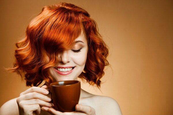 A passionate girl with a cup of coffee