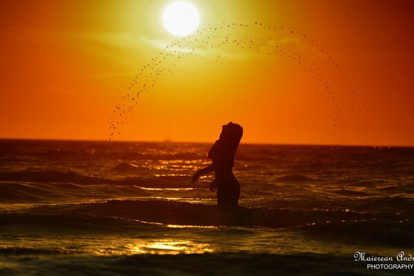 Beautiful girl at sunset