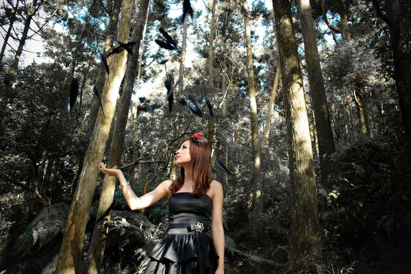 A girl in nature. Trees. Forest