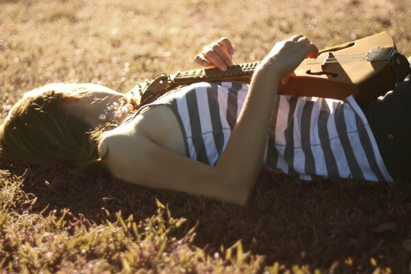 Romantic with a tool on the grass under the sun