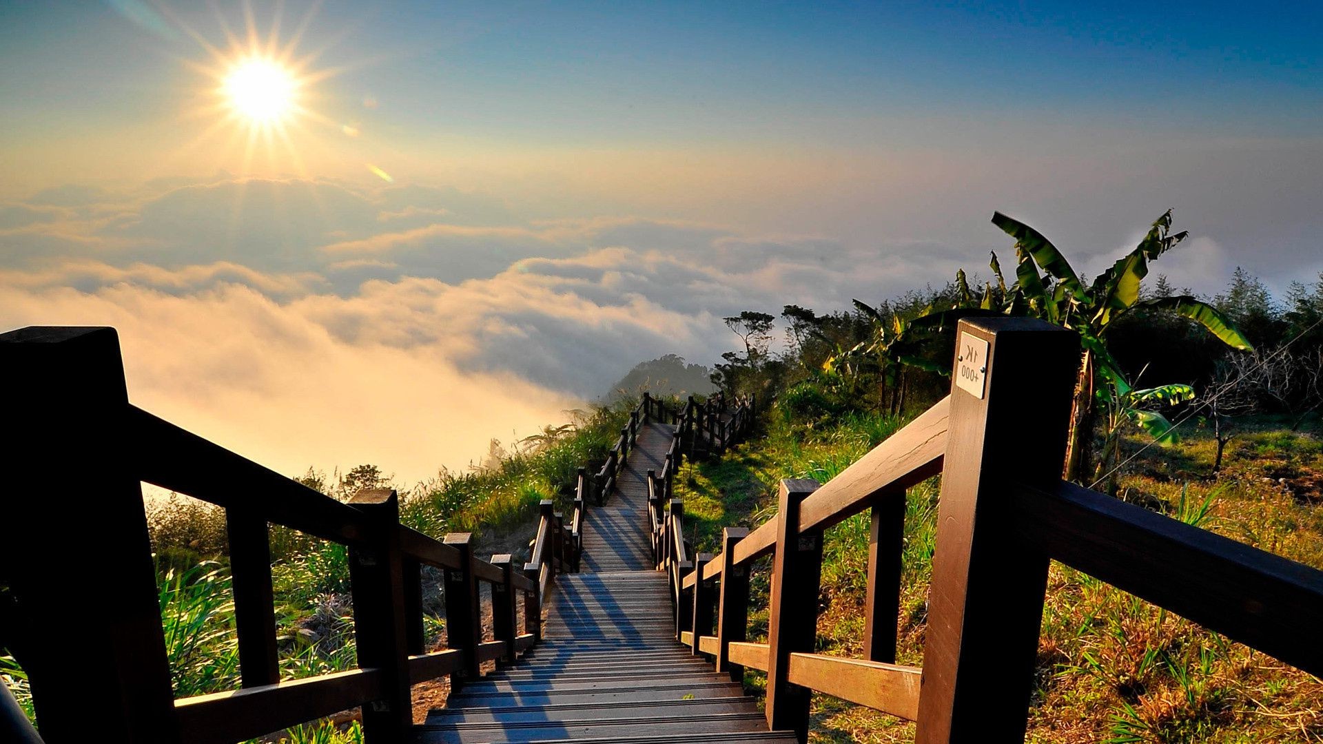 sonnenlicht und strahlen sonnenuntergang dämmerung himmel sonne reisen natur holz licht im freien landschaft gutes wetter baum sommer brücke guide berge