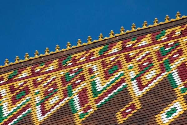 Decoration of a part of the house against the sky