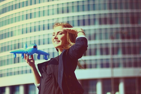 The girl pays homage to pilots and airplanes