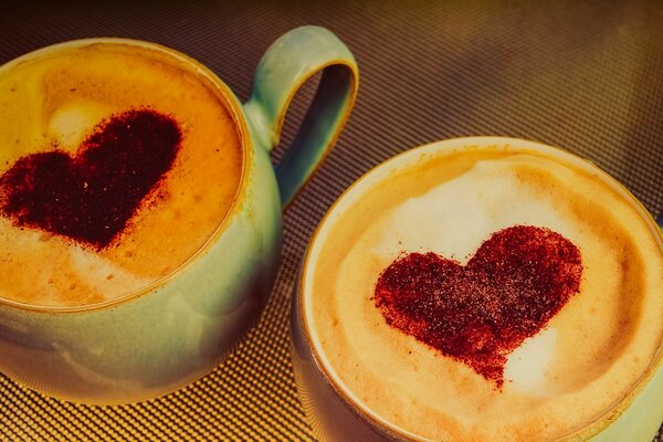 Hearts in coffee with cream for breakfast