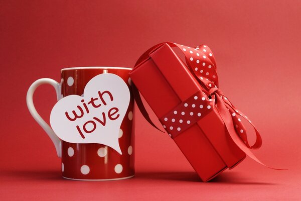 Gift mug with hearts on wallpaper background