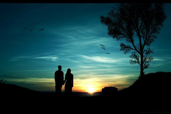 Silhouettes against the background of the setting sun