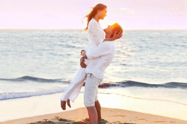 Hearts and the sea appear on the beach