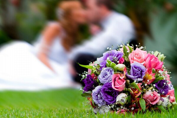 Bride s bouquet on a green field