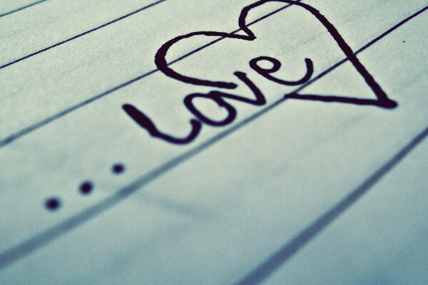 A heart with the inscription love on paper