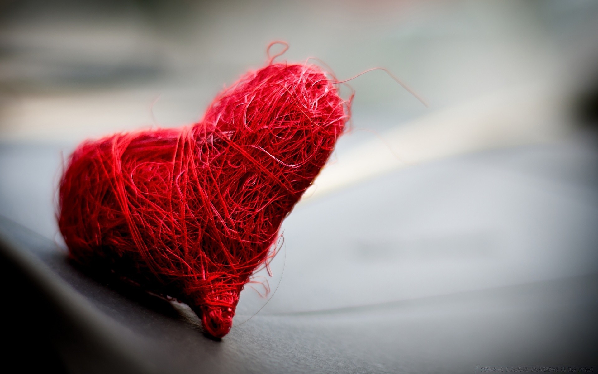 hearts thread ball needle desktop color close-up still life