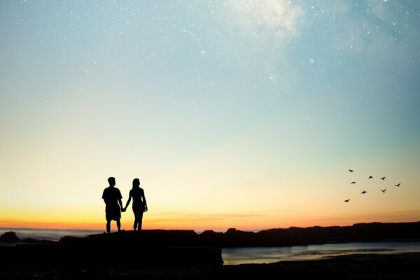 Couple lovers sunset sea