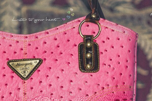 Fashionable pink bag with hearts