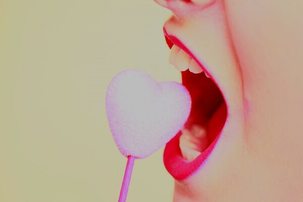 Lollipop in the form of a pink heart