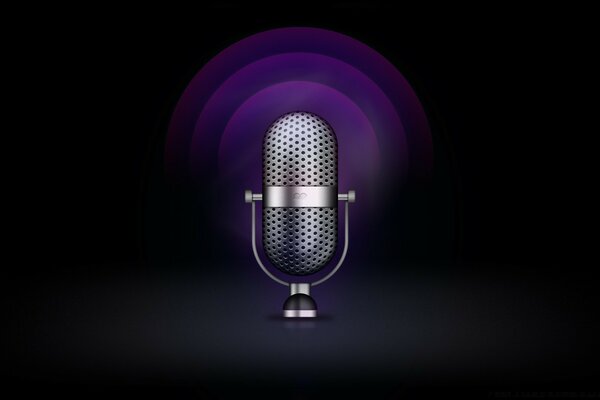 Silver microphone on black background