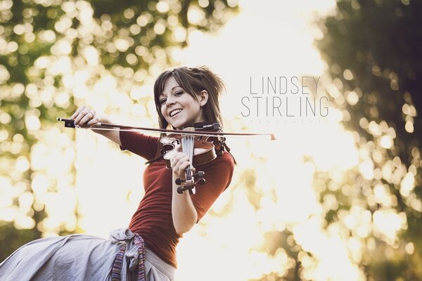 Beautiful girl playing the violin