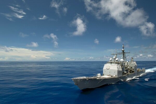 A warship sails on the sea