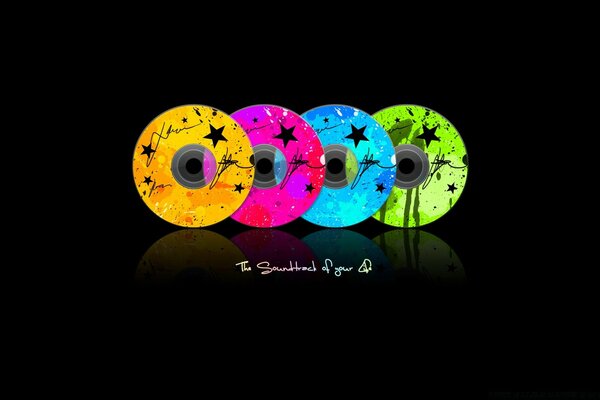 Bright multicolored discs on a black background