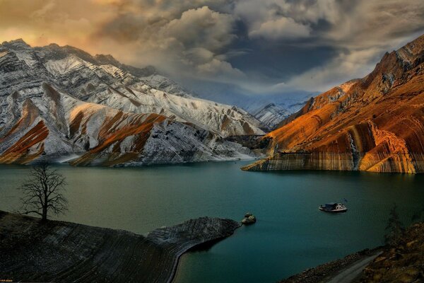 Harsh sky over a mountain lake