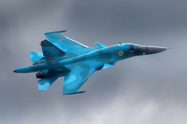 Military fighter on a gray background