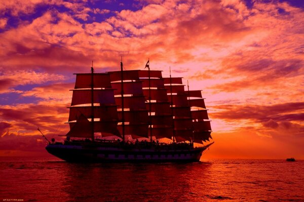 Sailing ships sunset at sea