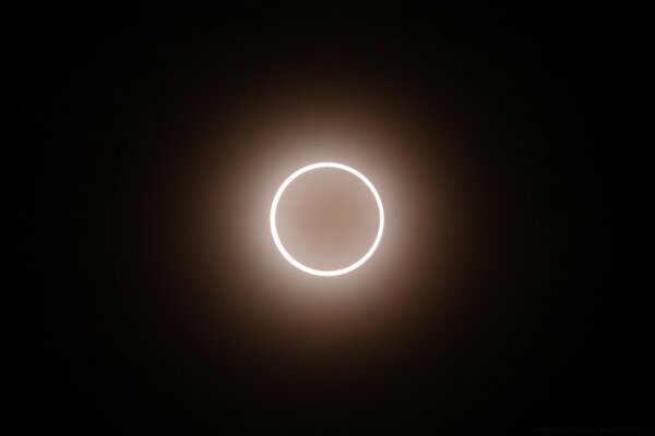 A bright eclipse on a dark background