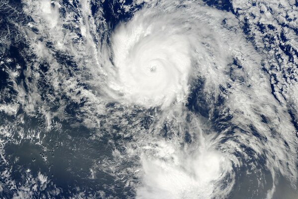 A view of clouds from space similar to a snow vortex