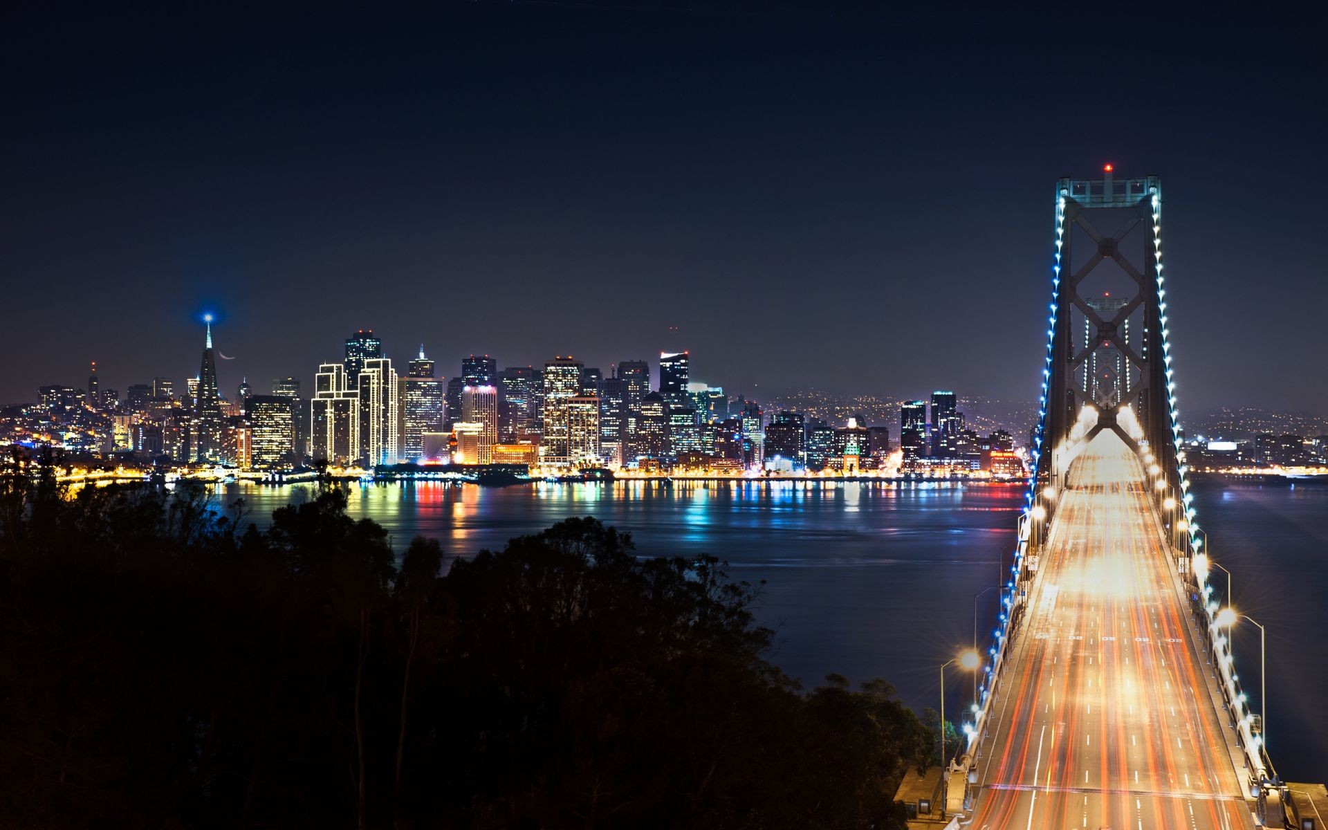 puentes ciudad puente arquitectura skyline ciudad viajes crepúsculo agua noche puesta de sol río cielo rascacielos urbano centro de la ciudad casa torre negocio reflexión