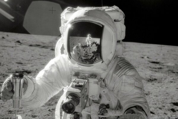 Black and white photo of an astronaut on the moon