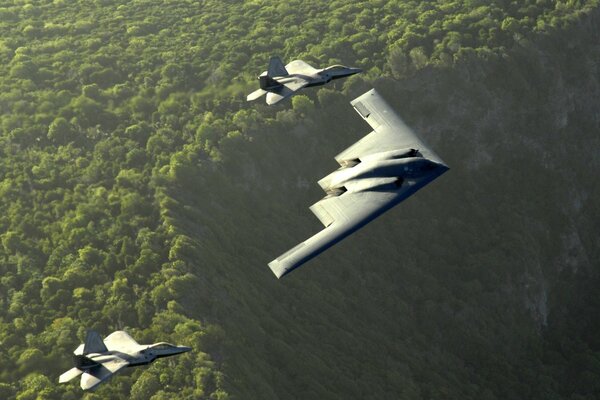 A group of modern aircraft over the jungle