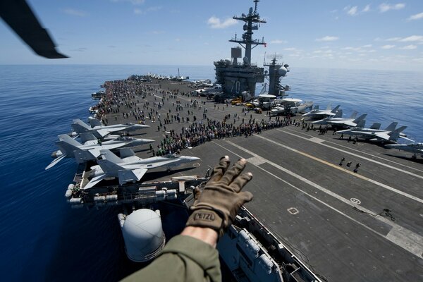 View from a helicopter that lands on an aircraft carrier