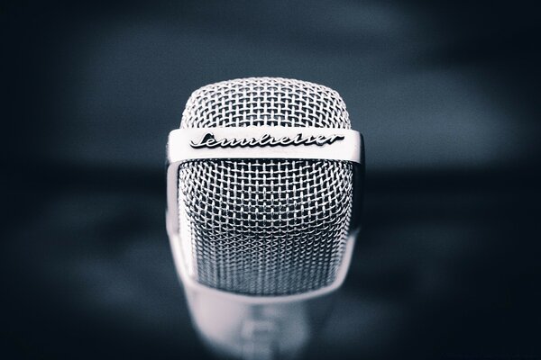 A silver microphone is waiting for the performer