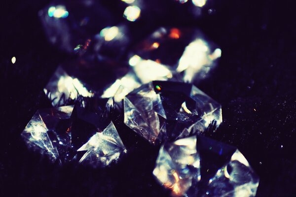 Large gems on a dark background